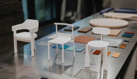 Chair exhibition installation with objects and sketches