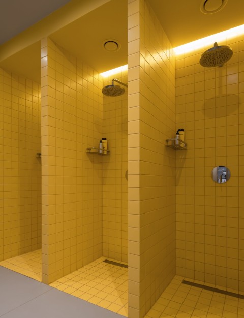 Detail of yellow sports fabric and functional design element at Act.now Sport Studio