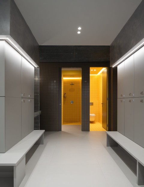 Yellow accent detail at Act.now Sport Studio