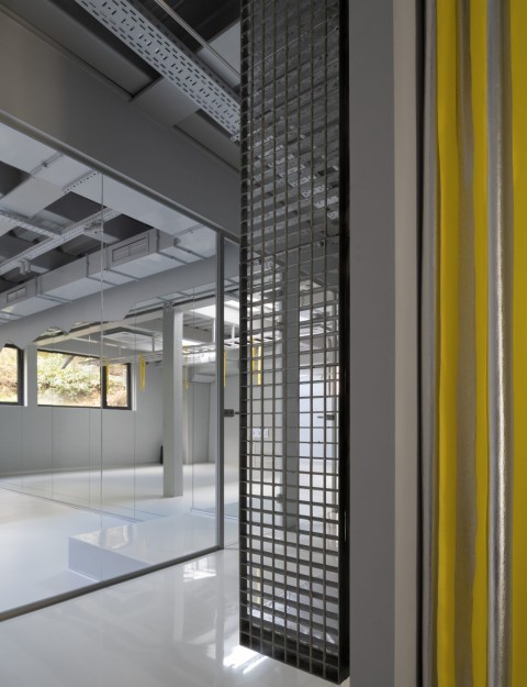 Act.now Sport Studio material and wall detail with carved branding concept