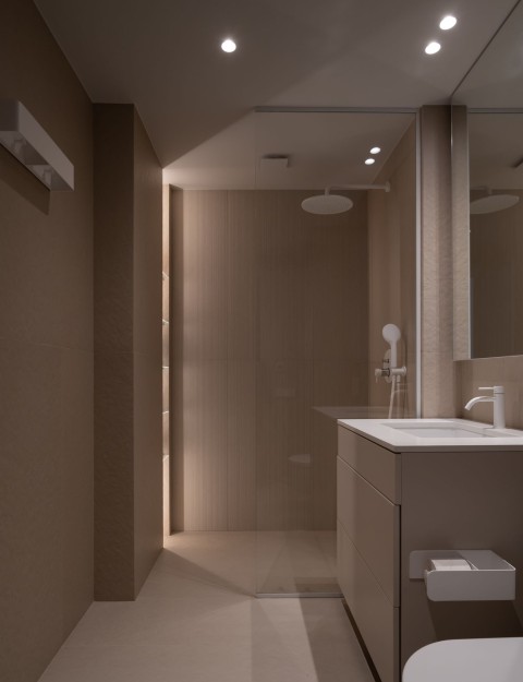 Shower and dark blue bathroom detail in Belgrade Waterfront Apartment