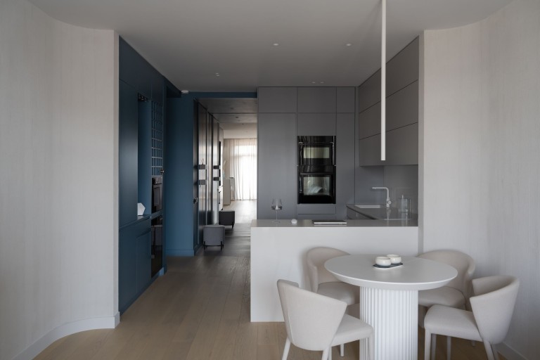 Belgrade Waterfront Apartment living room with neutral tones, dark blue accents and city views
