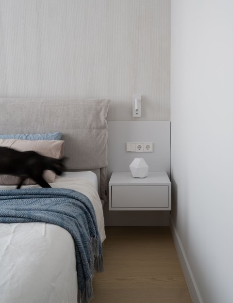 Study sofa and built-in cabinet detail in Belgrade Waterfront Apartment