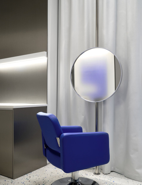 Vertical view of colorful BIG Laboratory training stations and reflective surfaces
