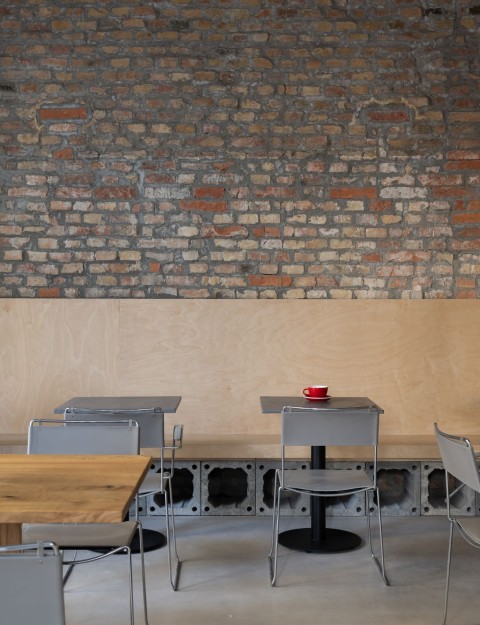 Close-up of concrete blocks, brick and construction materials in the Chernyi cafe interior