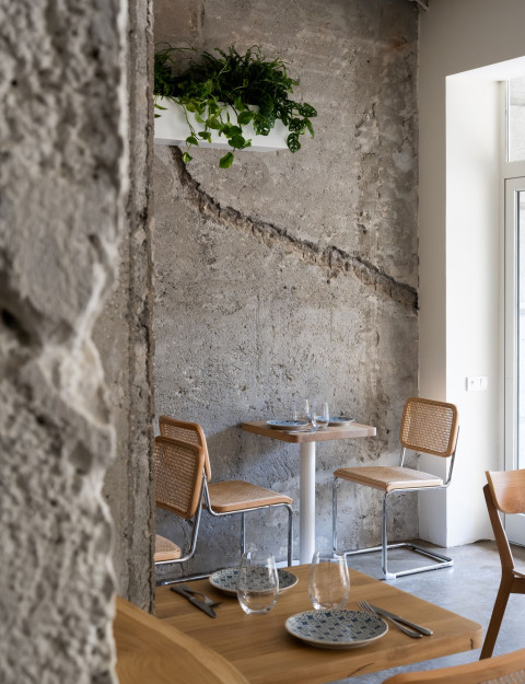 Table setting and textured interior detail at Embers Restaurant