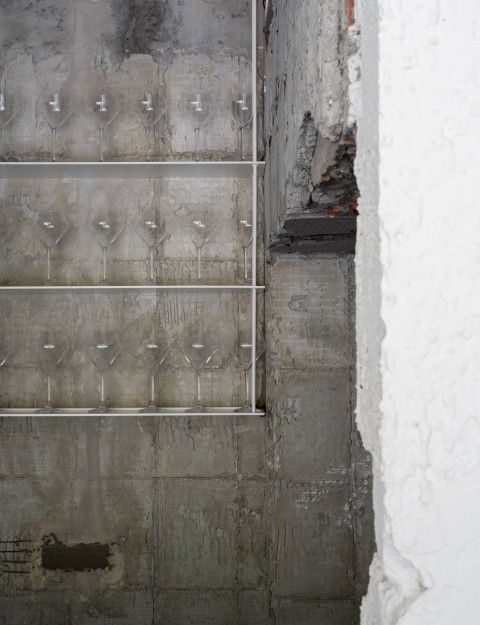 Seating detail with layered materials inside Embers Restaurant