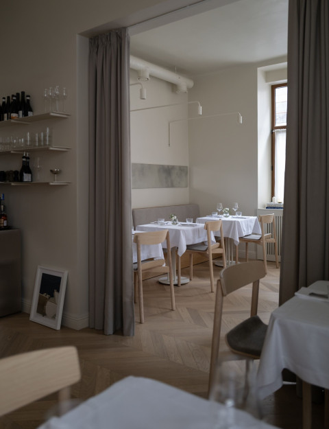 Vertical architectural detail inside Fresca Restaurant with soft lighting and historic proportions