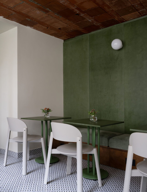 Fresca Deli vertical detail with green plywood, textures and visible construction elements