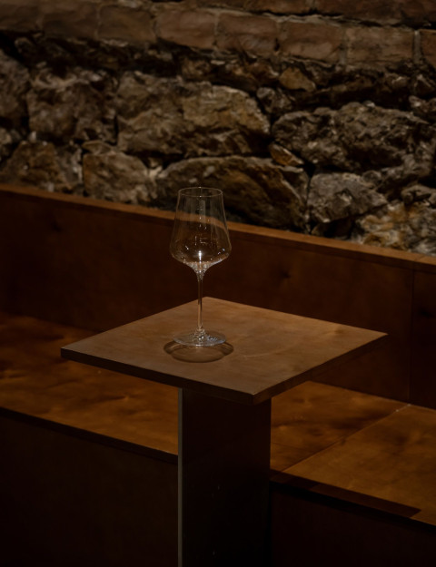 Fresca Cellar vertical detail showing preserved brickwork and tasting room materials
