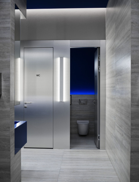Vertical view of an auxiliary fitness club area with precise lighting at Gate-X Fitness Club