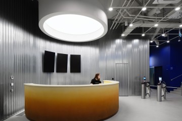 Futuristic reception and gym interior at Gate-X Fitness Club in Moscow