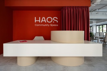 Haos Community Space coworking interior in Belgrade with terracotta core and Brutalist-inspired design