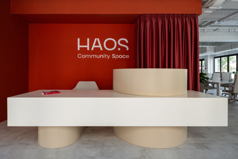 Haos Community Space coworking interior in Belgrade with terracotta core and Brutalist-inspired design