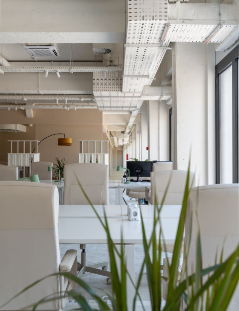 Vertical lounge detail at Haos Community Space with mural pattern and cozy coworking atmosphere