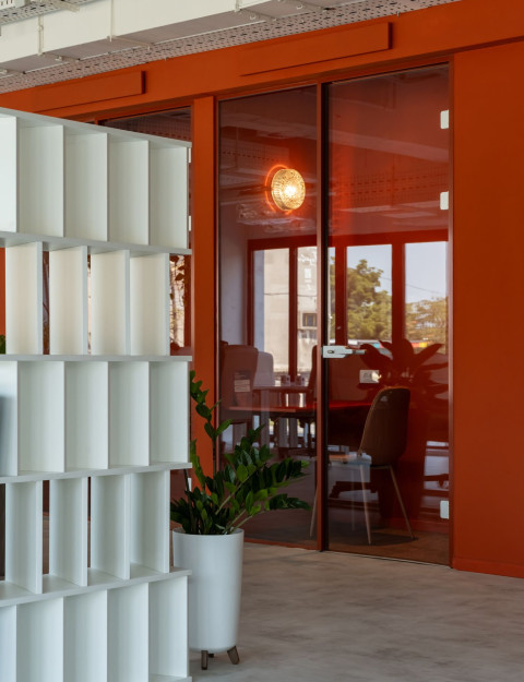 Vertical detail of Haos Community Space coworking furniture and color palette