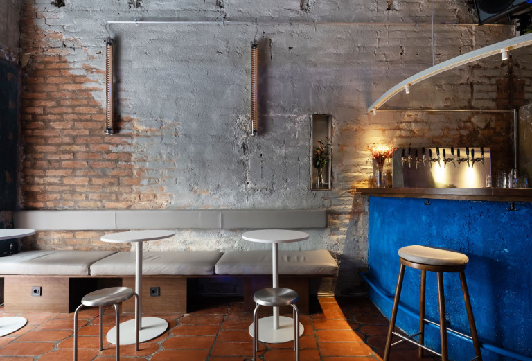 KuKu Bar interior with lounge seating, vintage colors and a music bar atmosphere