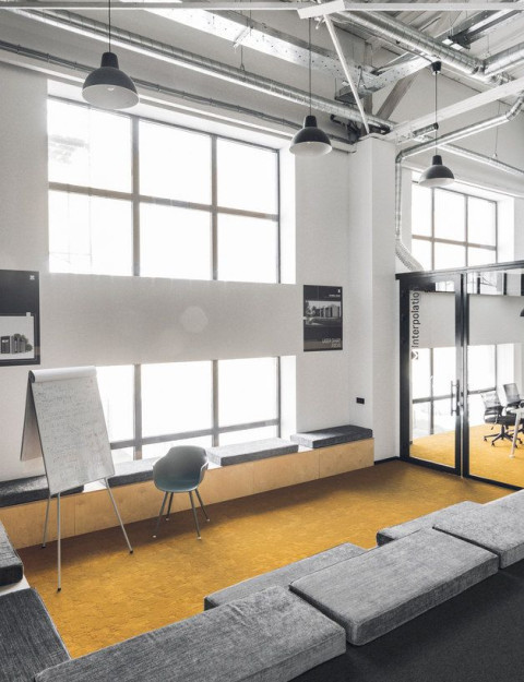 Amphitheater seating and presentation area inside the Mighty Buildings office