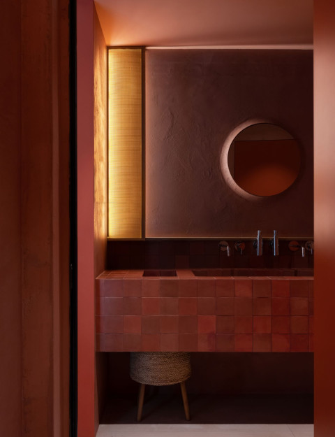 Peers restaurant seating detail with warm light and textured surfaces