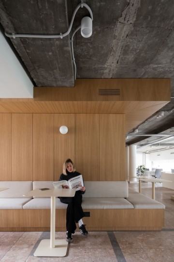 PFU Coworking vertical interior view with oak furniture, desk lamps and warm office atmosphere