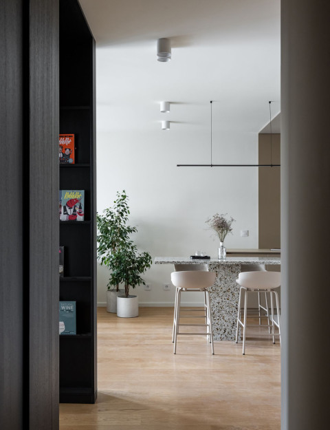 Living room window and neutral seating area in Vracar Apartment