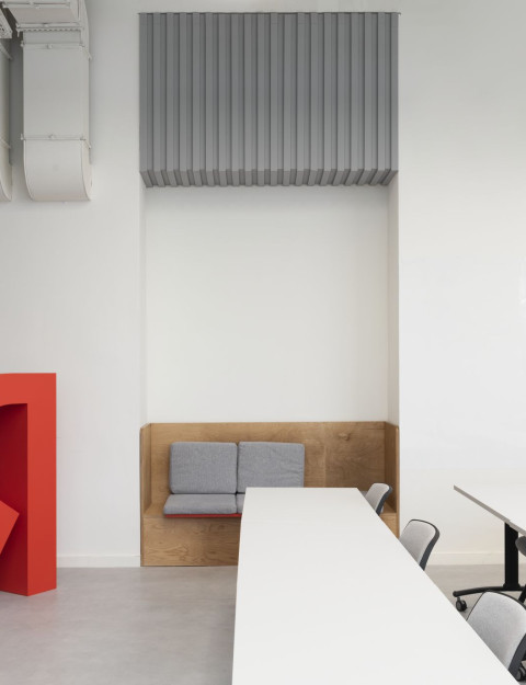 Lounge view of Yandex x ITMO laboratory with soft seating and yellow spatial elements