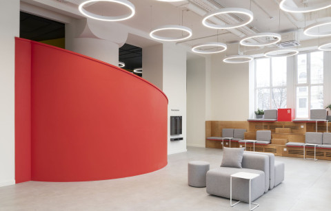 Flexible hall inside Yandex x ITMO laboratory with movable furniture and workshop layout