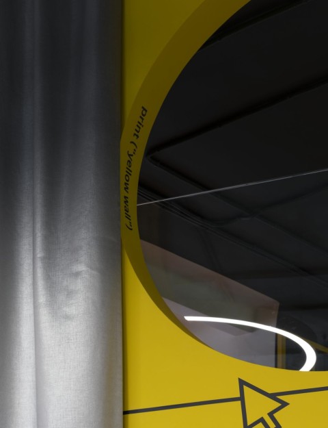 Workshop detail inside Yandex x ITMO laboratory with flexible furniture and yellow accents