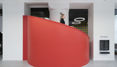 Wide view of Yandex x ITMO laboratory with yellow wall, open floor and flexible student zones