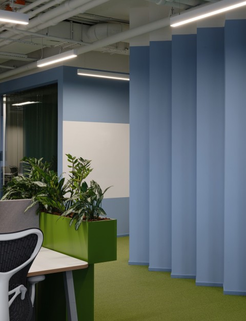 Bright office zone at Yandex Office 03 with desks and glass partitions