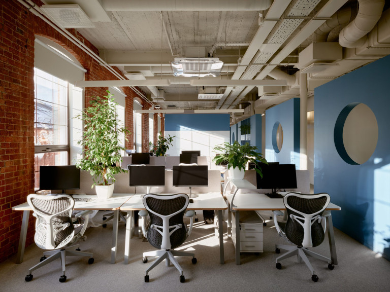 Yandex Office 02 open workspace in Moscow with blue partitions, natural wood and historic brick context