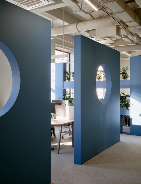 Vertical view of Yandex Office 02 with soft blue partitions and open office circulation